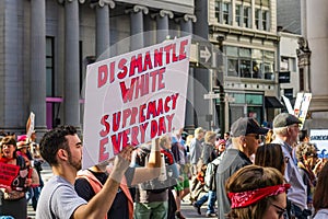 January 19, 2019 San Francisco / CA / USA - Women`s March `Dismantle White Supremacy` sign