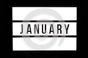 JANUARY text in a light box