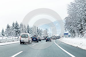 January 12th, 2019 - Salzburg, Austria: Winter highway with many different cars stucked in traffic jam due ti bad