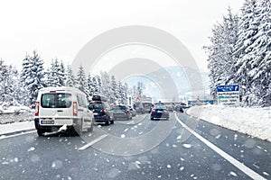 January 12th, 2019 - Salzburg, Austria: Winter highway with many different cars stucked in traffic jam due ti bad