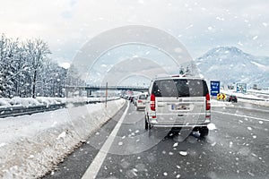 January 12th, 2019 - Salzburg, Austria: Winter highway with many different cars stucked in traffic jam due ti bad