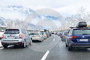 January 12th, 2019 - Salzburg, Austria: Winter highway with many different cars stucked in traffic jam due ti bad