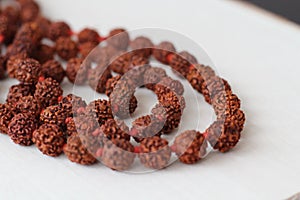 Japa mala. Prayer beads made from the seeds of the rudraksha tree. close-up