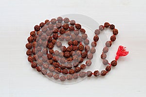 Japa mala. Prayer beads made from the seeds of the rudraksha tree photo