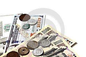 Japan banknotes and coins and dollar isolated on a white background