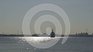 Japan Coast Guard ship Mizuho performing a lifeboat drill at Nagoya port in Ise Bay, Japan