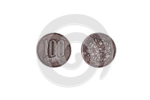 Japan coin 100 yen, black background. close-up, obverse and reverse