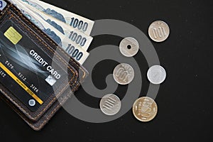 Japan currency paper banknote and coins on dark background, banking economic and finance concept, Japanese money investment ,