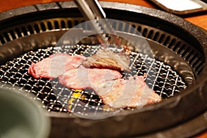 Japan food Tokio restourant hot food meat for roasting photo