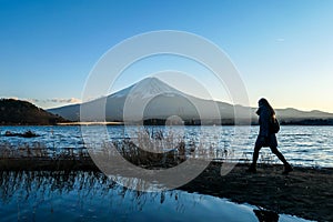 Japan - A girl walking along the Kawaguchiko Lake