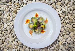 Japan gourmet cuisine -  delicious and delicate dish of Japanese sushi rolls in slate on stone background in traditional healthy