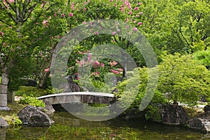 Japan Himeji Himeji Koko-en Gardens stone bridge over stream