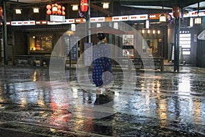 Japan, Kyoto - Portrait of traditional Japanese woman. Gion District at night