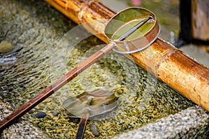 Japan Ladle water in Shrines or Temple for visitor purify.