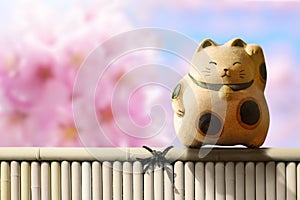 Japan Maneki Neko or beckoning cat, mascot of lucky and money, P