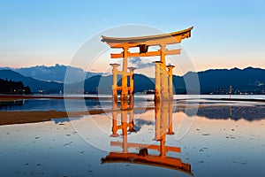 Japan. Miyajima. Hiroshima. Itsukushima Shrine and floating torii gate at sunset