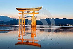 Japan. Miyajima. Hiroshima. Itsukushima Shrine and floating torii gate at sunset