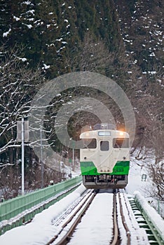 Japan mountain and snow with local train