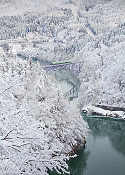 Japan mountain and snow with local train