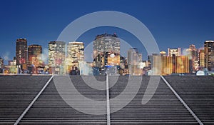 Japan, Osaka city at night with colorful lights and Bokeh and concrete stairways. City background