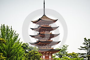 Japan pagoda closeup over white sky