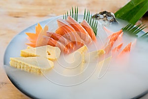 Japan raw salmon sashimi, sweet egg and imitation crab stick on