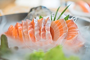 Japan raw salmon slice or salmon sashimi in Japanese style fresh serve on ice in Japanese restaurant