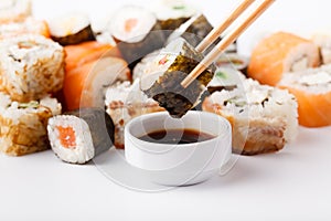 Japan rolls with fish and rice, pile asorted on table