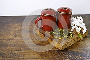 Japan's tea cups with green tea and sakura flowers