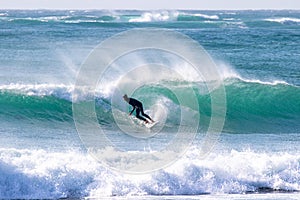 Japan Surf, a man surf many waves on many Surf boards during sunrise and sunset in a blue ocean. Surfing In Japan