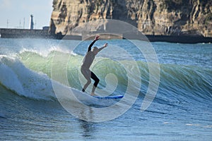 Japan Surf, a man surf many waves on many Surf boards during sunrise and sunset in a blue ocean. Surfing In Japan