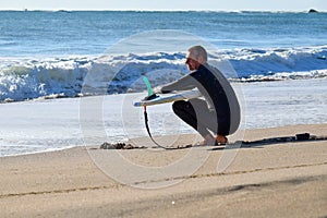 Japan Surf, a man surf many waves on many Surf boards during sunrise and sunset in a blue ocean. Surfing In Japan