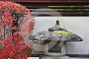 Japan Takayama Stone Lantern and bush in Autumn colors