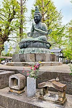 Japan. Tokyo. Senso ji temple at Asakusa. Two Buddhas