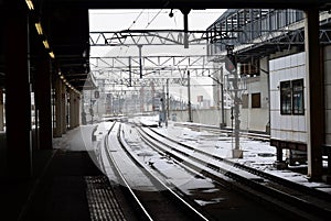 Japan train railroad and platform with snow, Sapporo, Japan