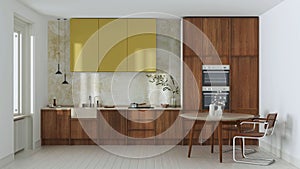 Japandi trendy wooden kitchen and dining room in white and yellow tones. Wooden cabinets, table, contemporary wallpaper and marble