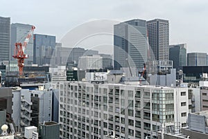 Japanese abstract urban background featuring details of chaotic city buildings and skyline in Tokyo