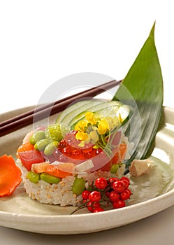 Japanese appetizer with tuna, rice and vegetables