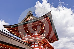 Japanese architectures against a beautiful sky in the famous Fushimi Inari shrine in Kyoto, Japan