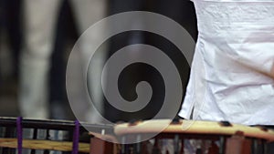 Japanese artist playing on traditional taiko drums