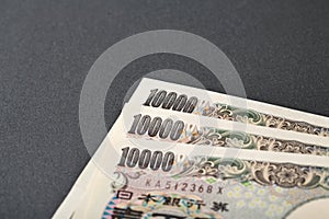 Japanese bank note 10000 yen on black background