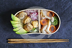 Japanese bento lunch box with tofu