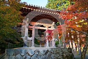 Japanese big temple bell in autumn garden