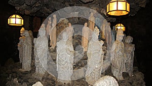 Japanese Boeddha statues in cave of Kosanji Temple in Japan