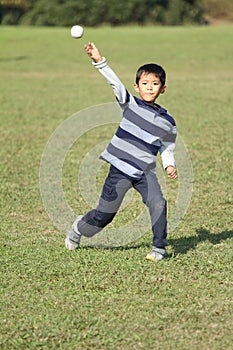 Japanese boy playing catch
