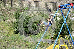 Japanese boy playing with flying fox