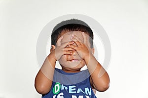 Japanese boy playing peek-a-boo