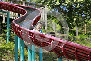 Japanese boy on the slide