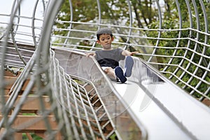 Japanese boy on the slide