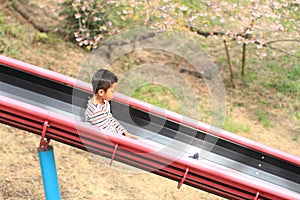 Japanese boy on the slide